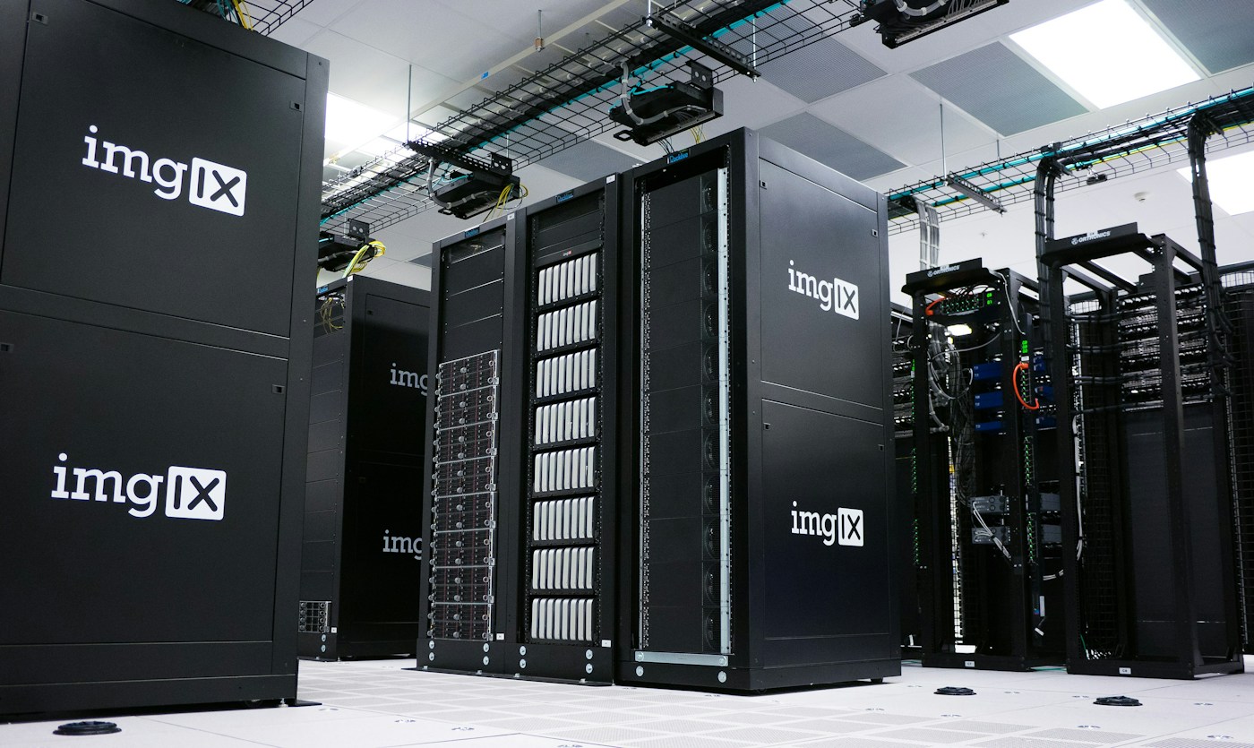 Server racks in a data center, shown as illustrative stock photography